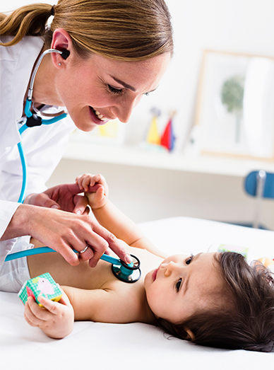 Pediatrician checking a baby’s heartbeat at Cranbourne West Medical Centre.